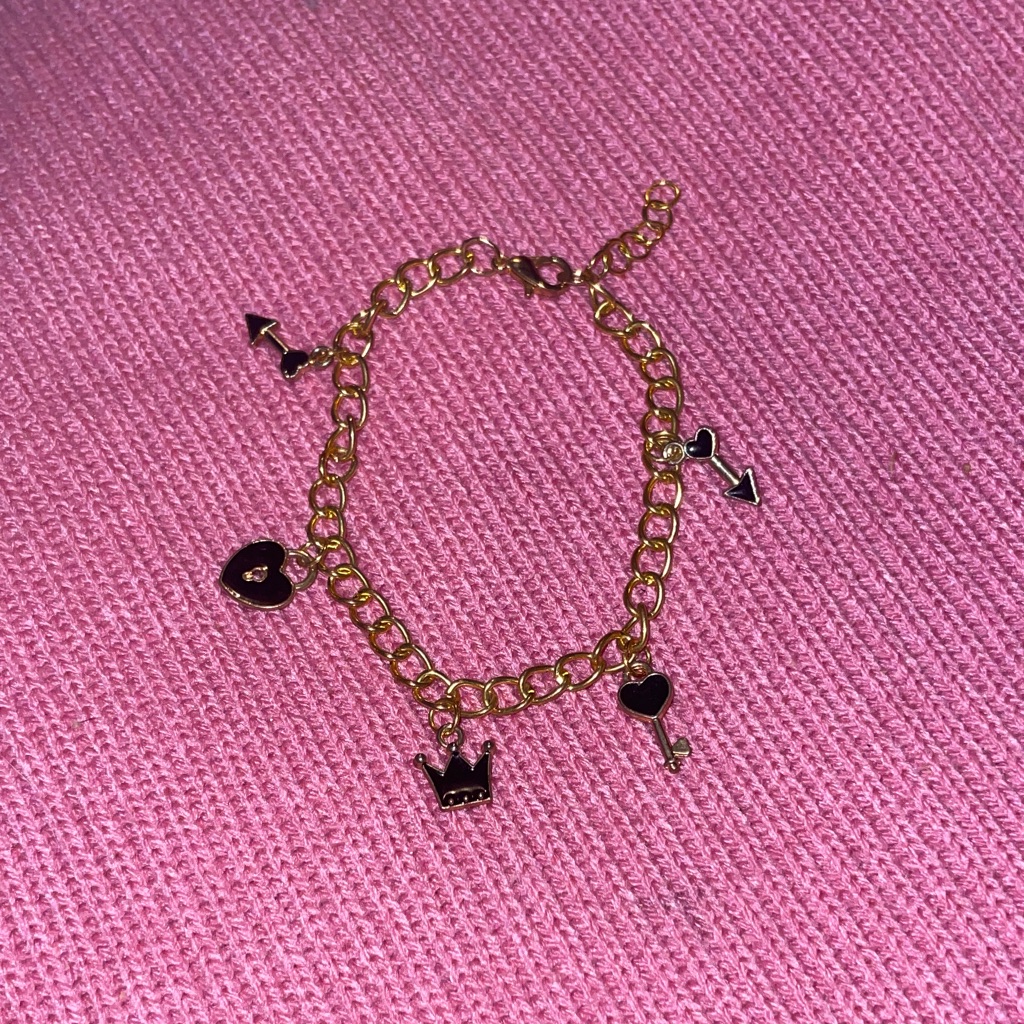 Gold Charm Bracelet With Black Accents